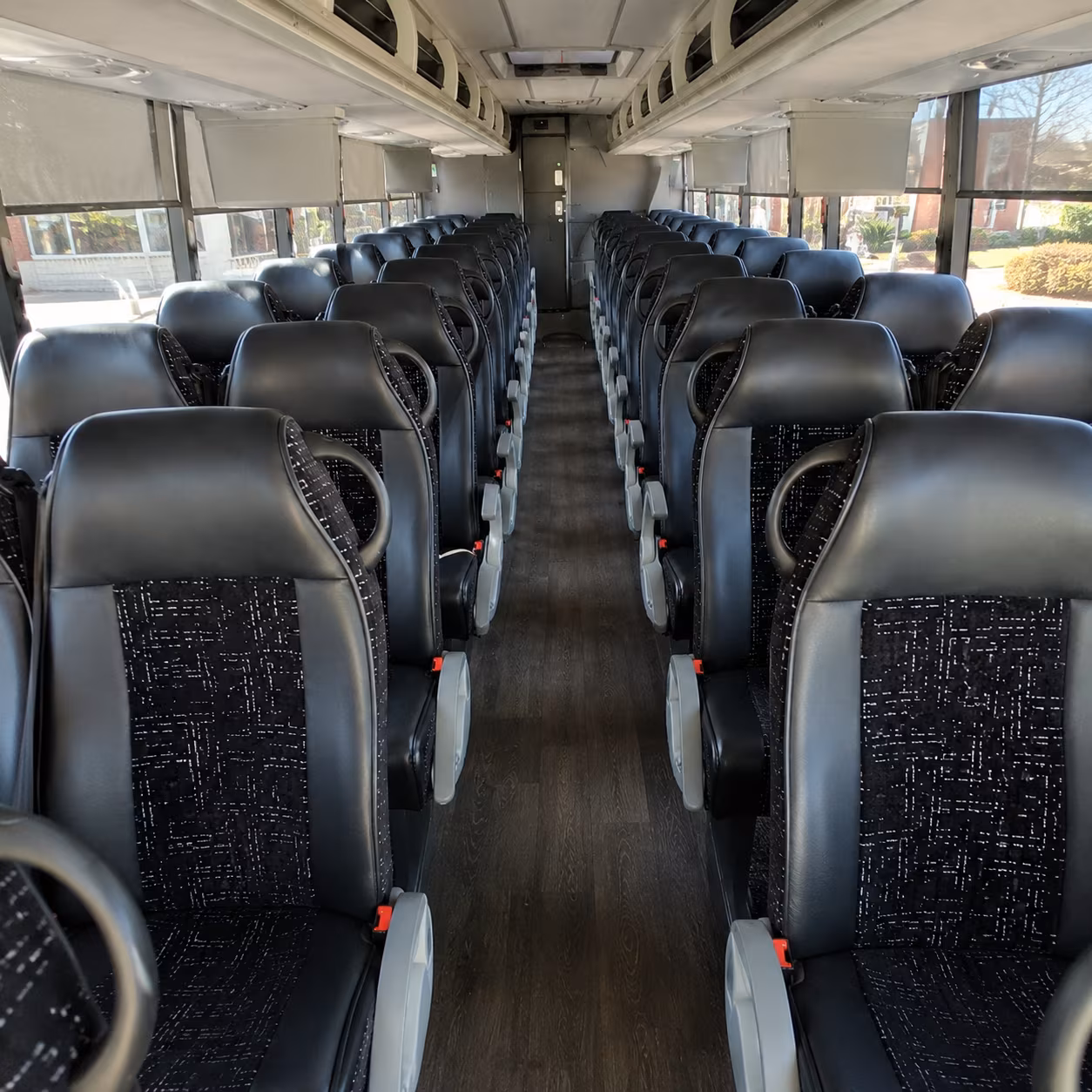 south gate 54 passenger charter bus inside
